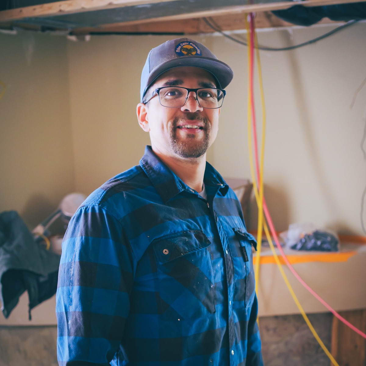 Blue Skies Plumbing owner on a residential plumbing jobsite in Spokane